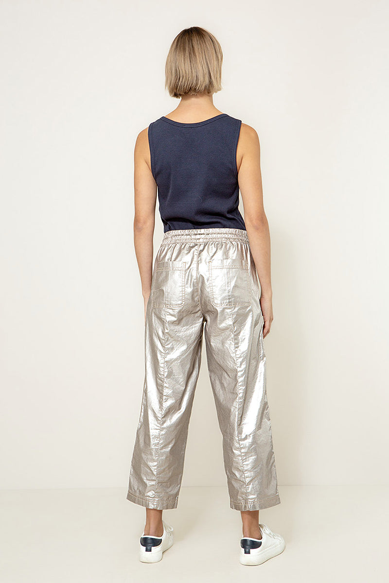 Trousers with a metallic look