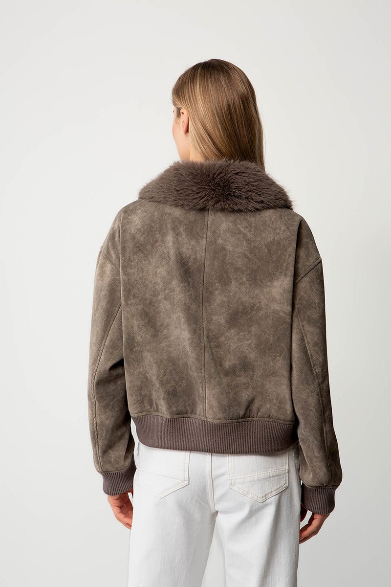 Jacket in vegan leather with faux fur collar