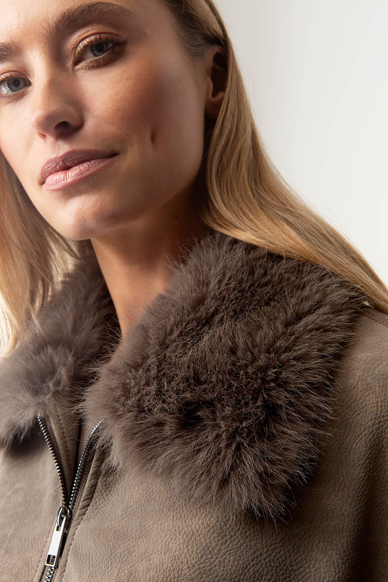 Jacket in vegan leather with faux fur collar