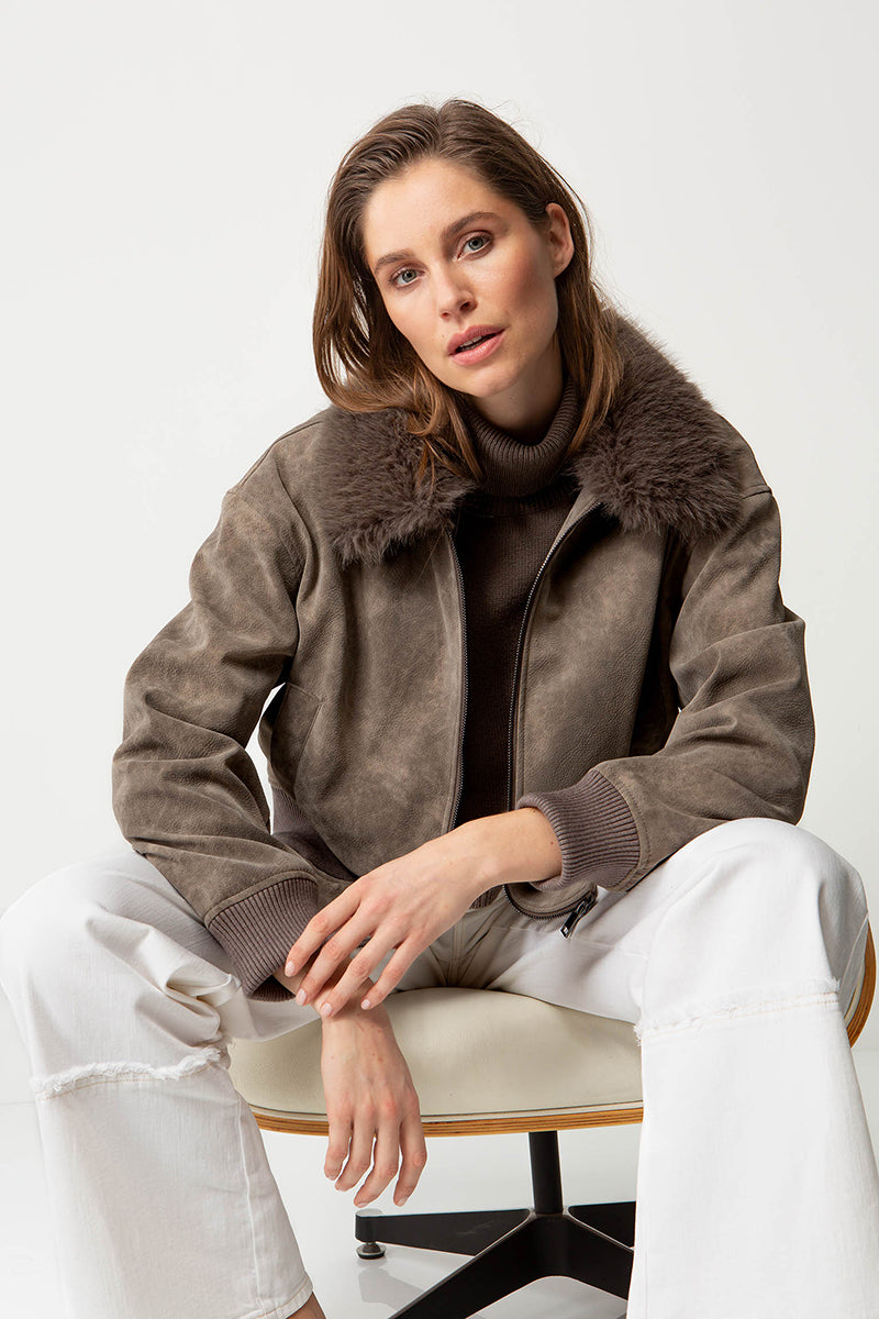 Jacket in vegan leather with faux fur collar