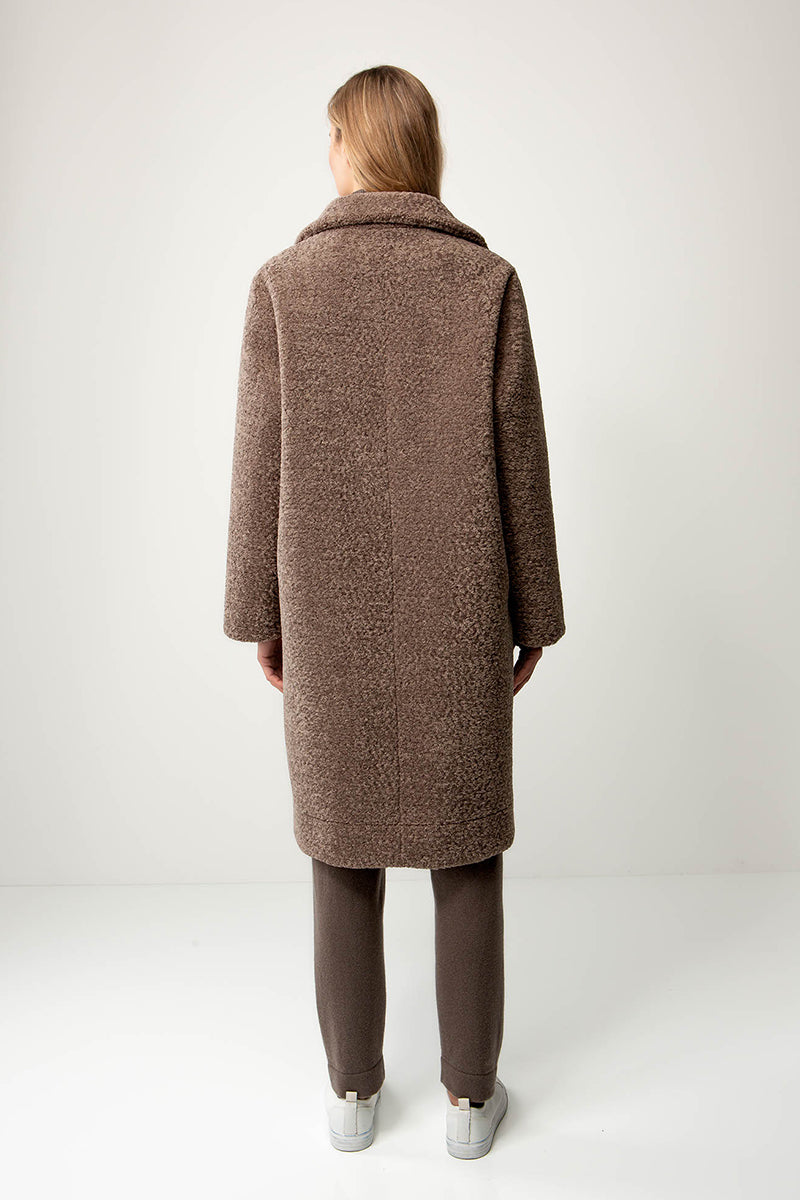 Coat in faux fur