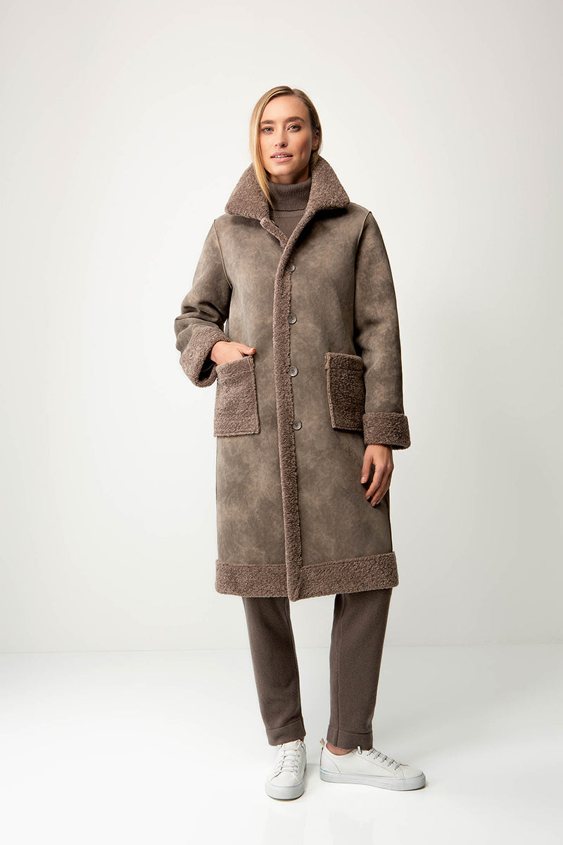 Coat in faux fur