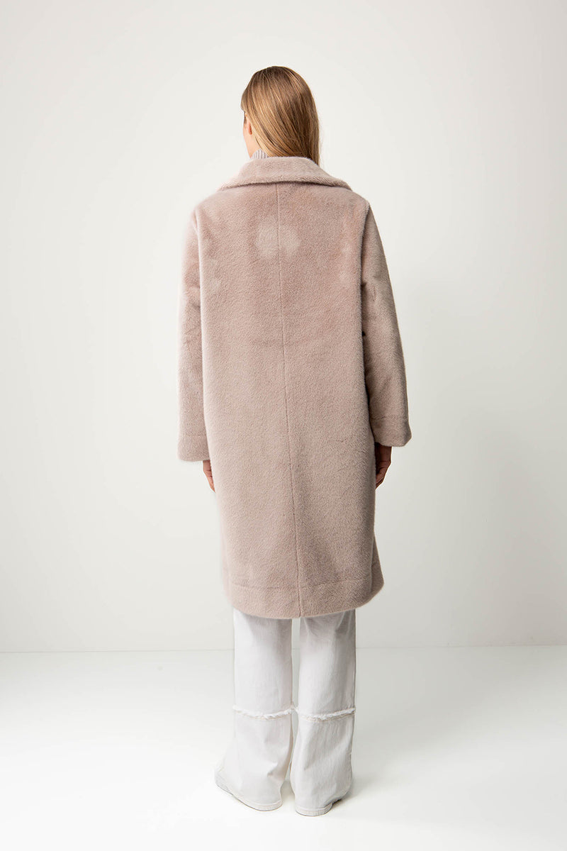 Coat in faux fur