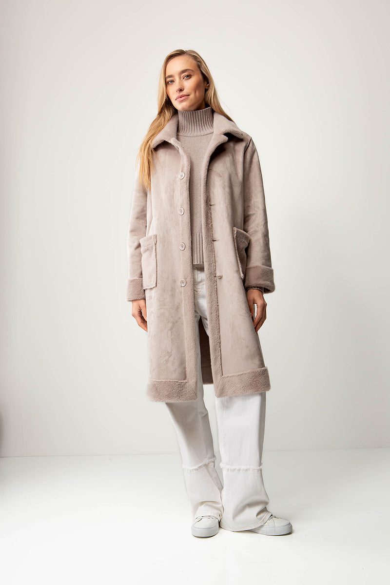 Coat in faux fur