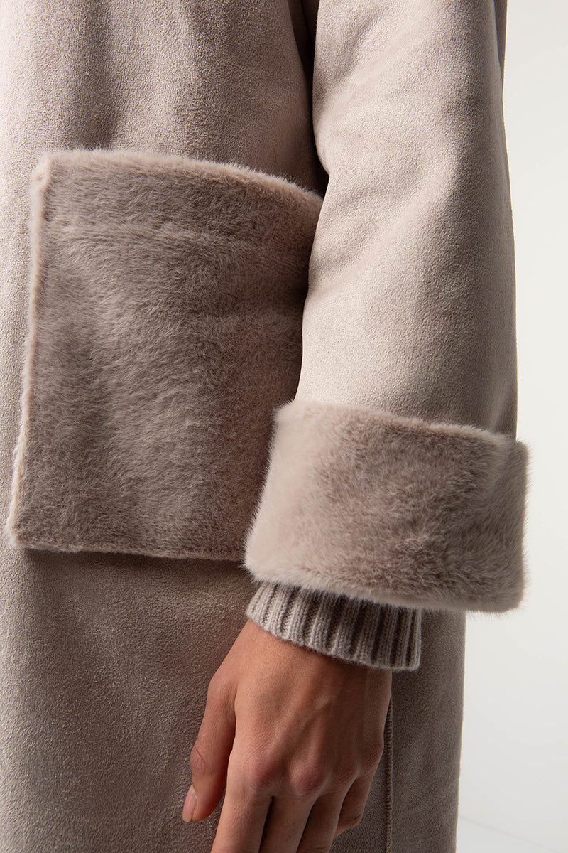 Coat in faux fur