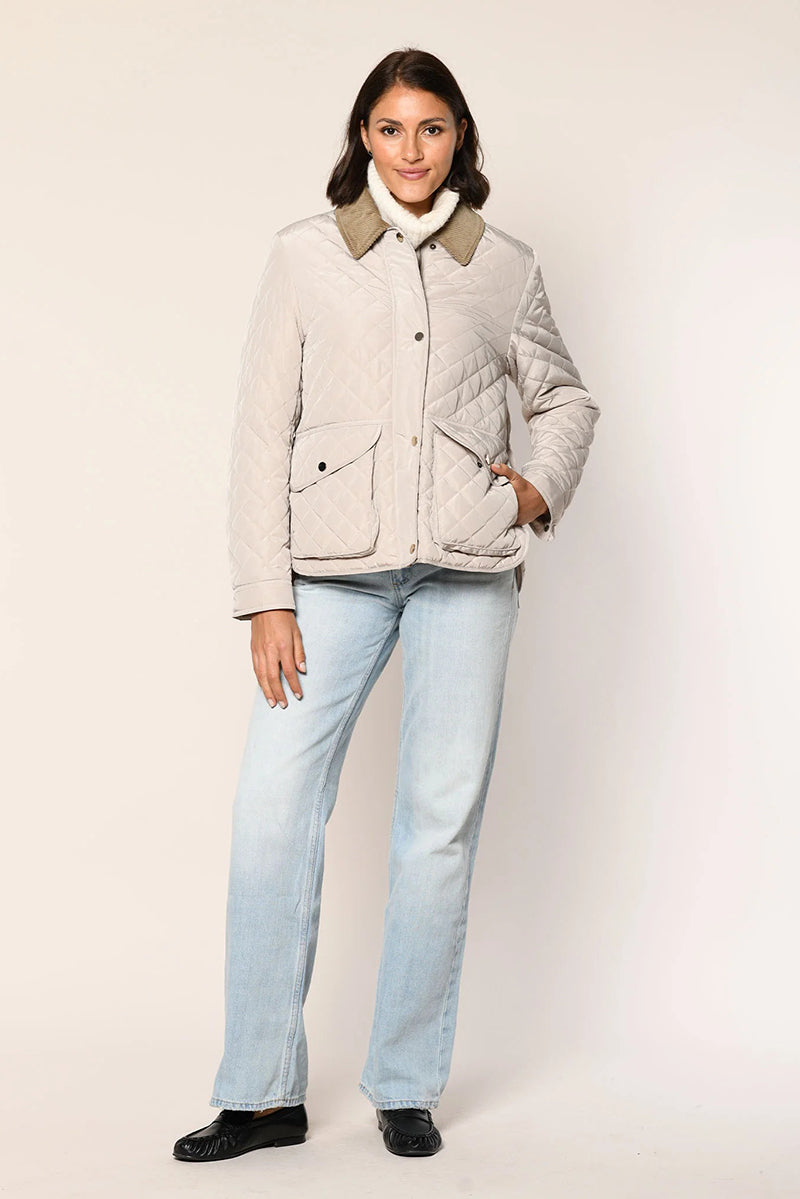 Quilted jacket with corduroy collar