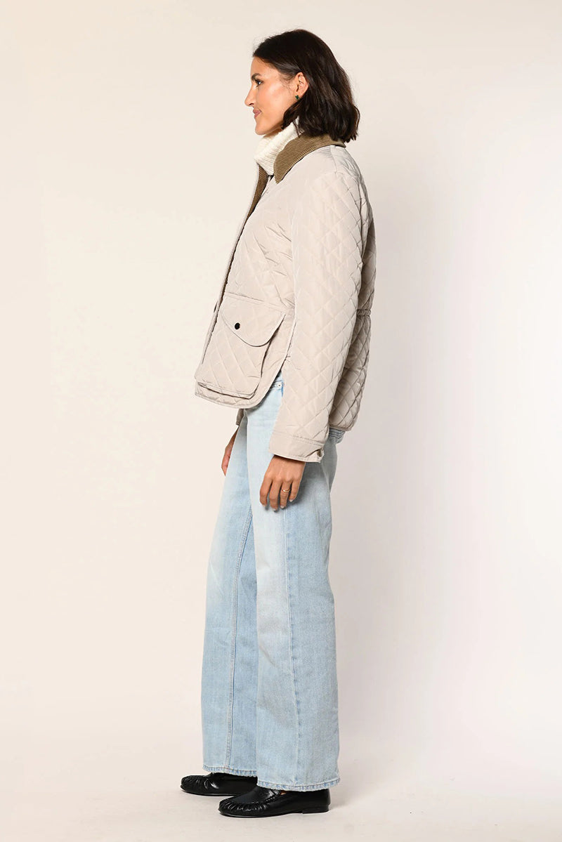 Quilted jacket with corduroy collar
