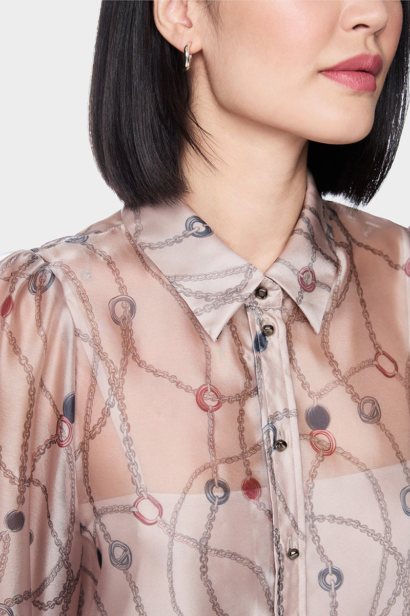 Delicate blouse with detachable top