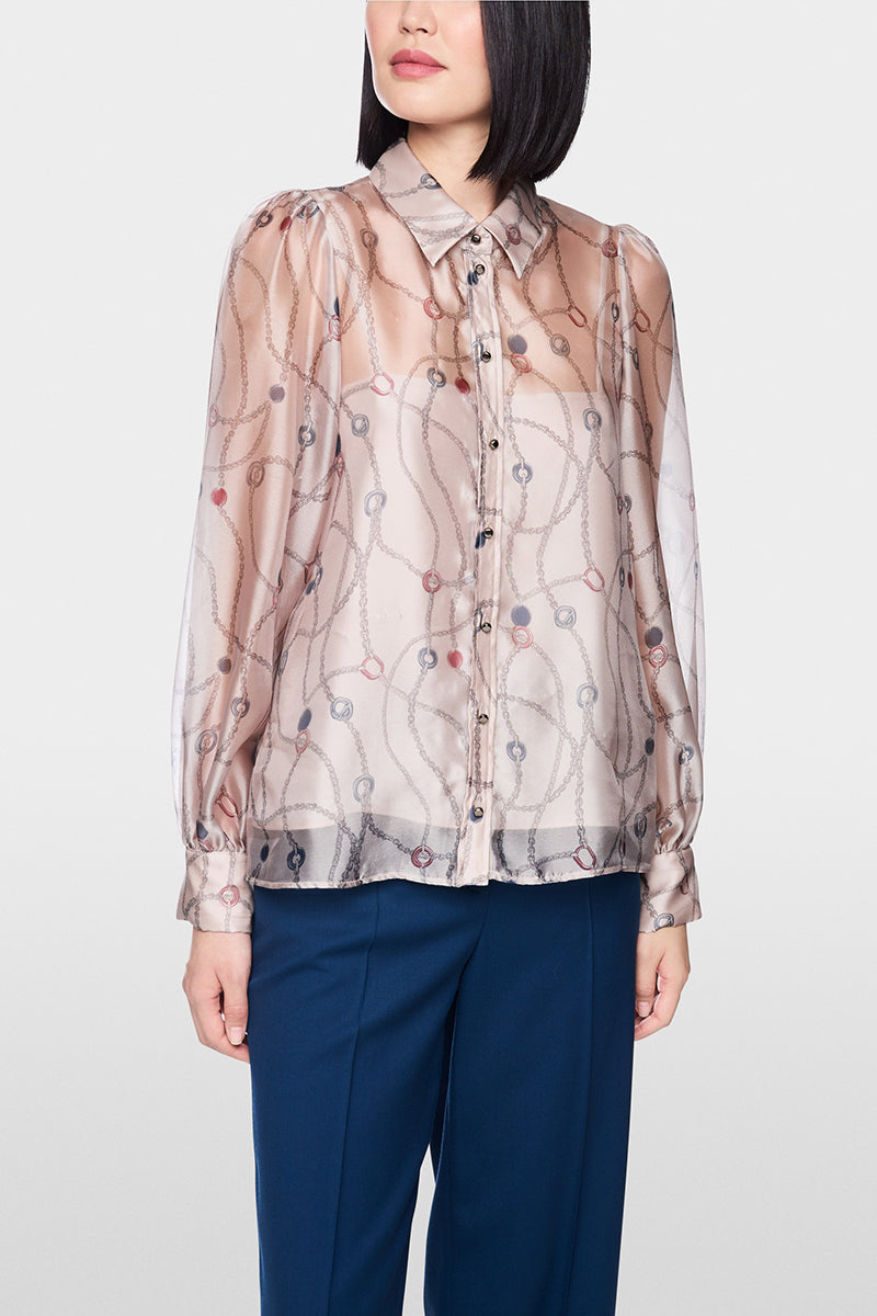 Delicate blouse with detachable top