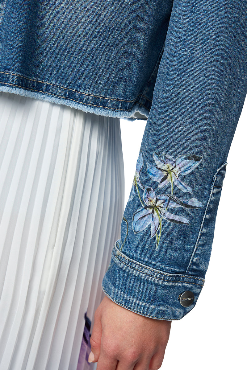 Denim jacket with floral print sleeves