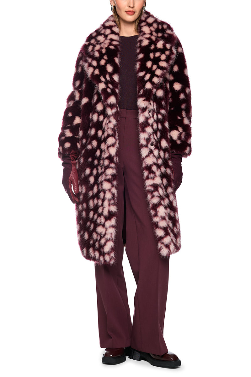 Coat with striking polka dot print