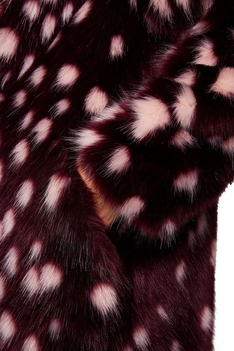 Coat with striking polka dot print