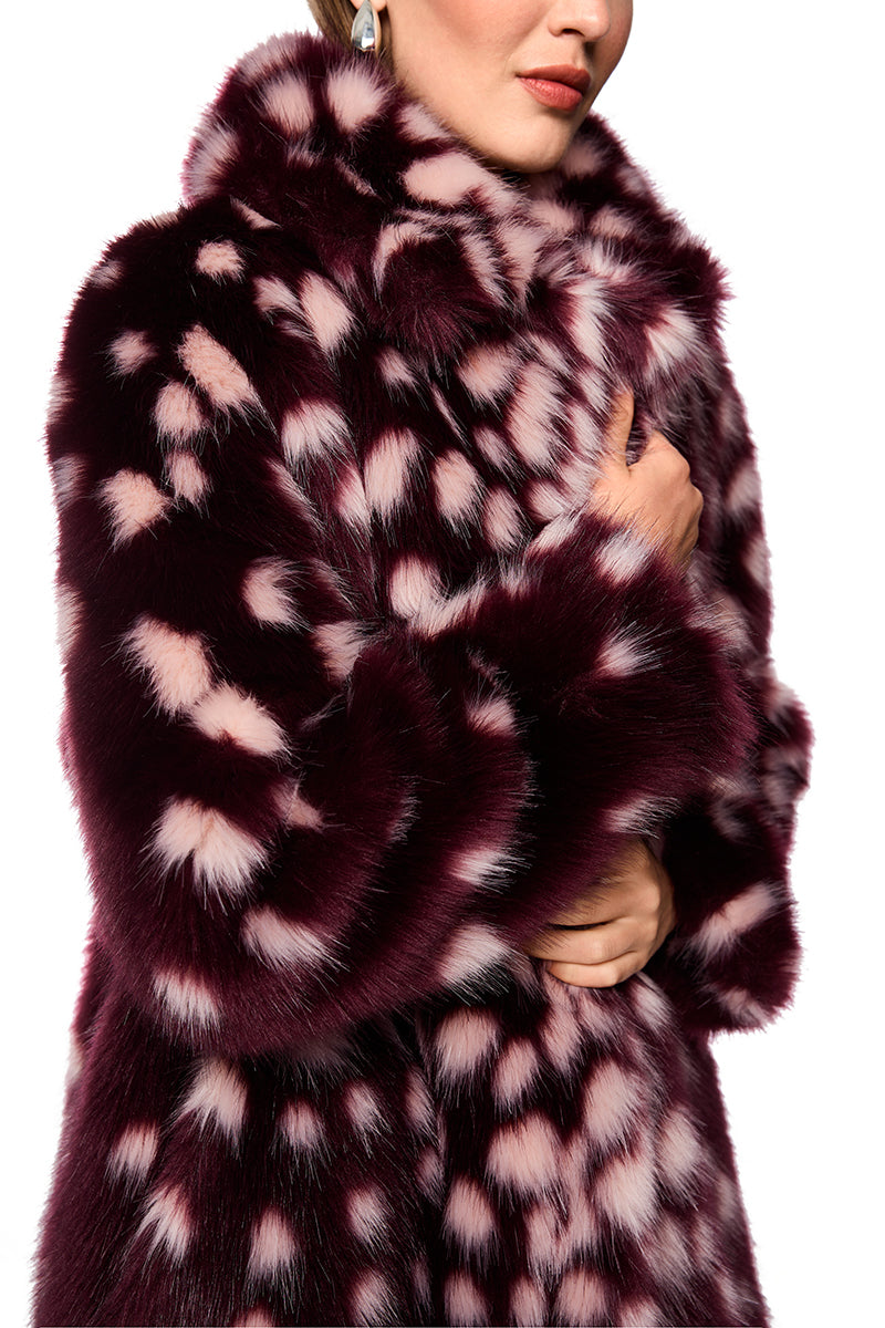 Coat with striking polka dot print