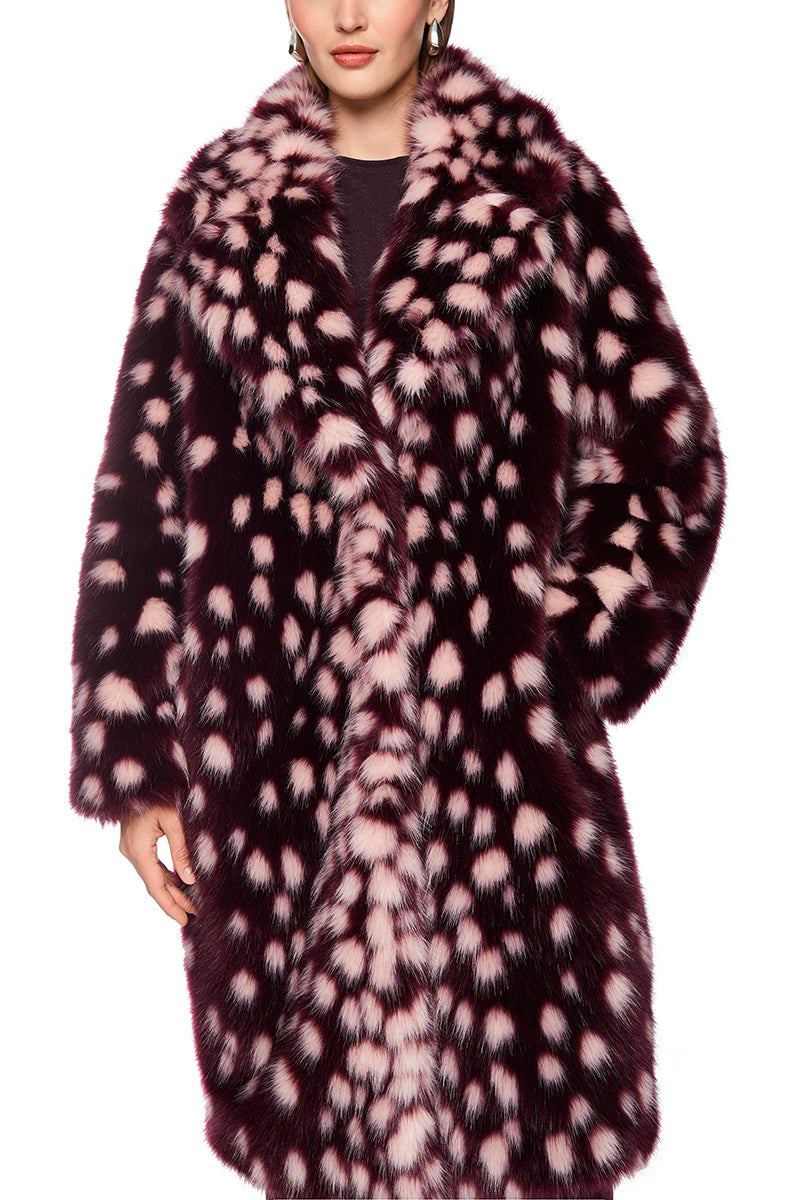 Coat with striking polka dot print