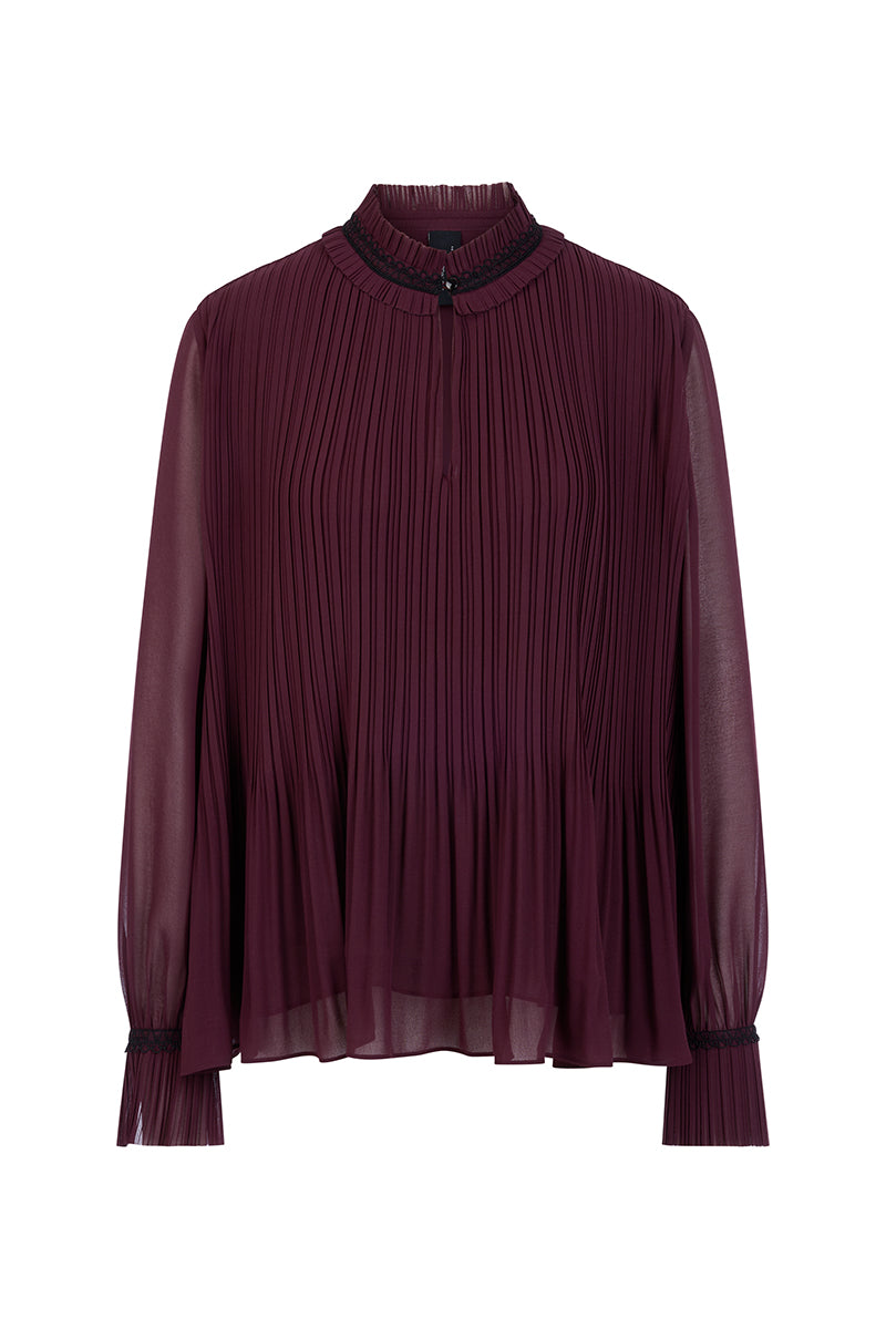 Pleated blouse with feminine details