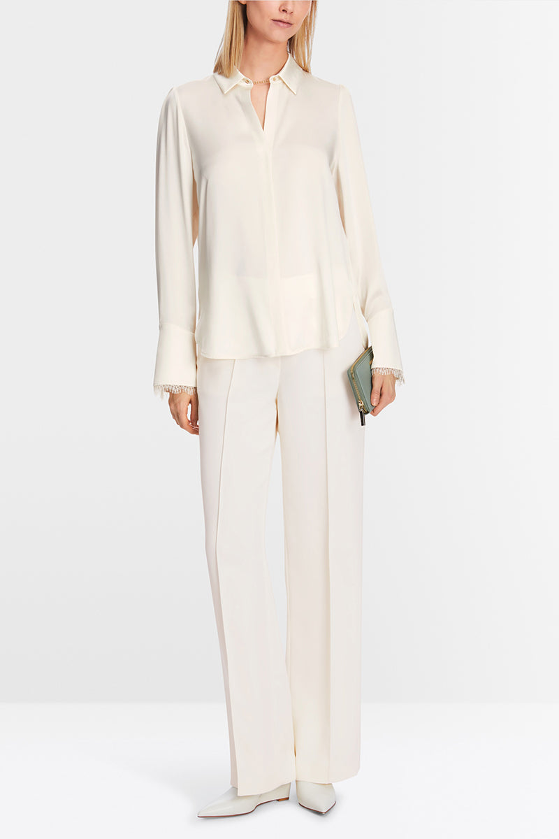 Fine silk blouse with chain button