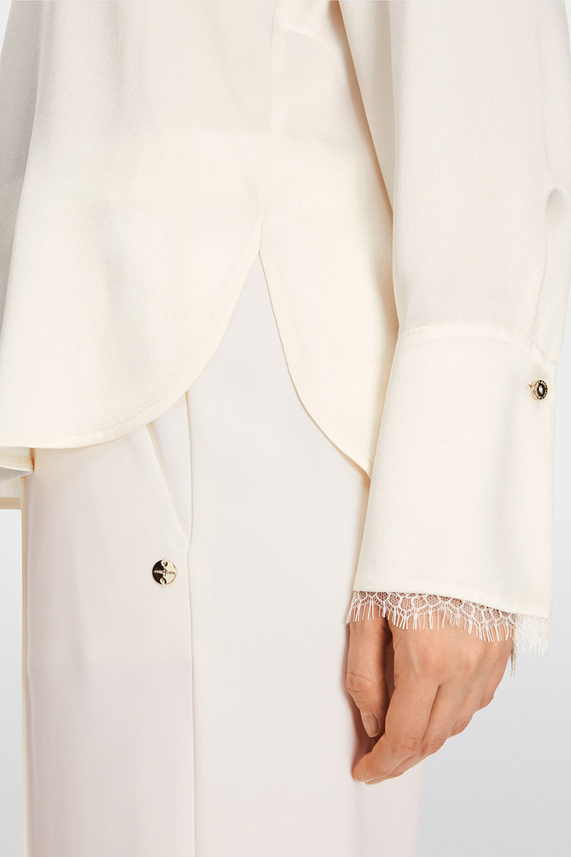 Fine silk blouse with chain button