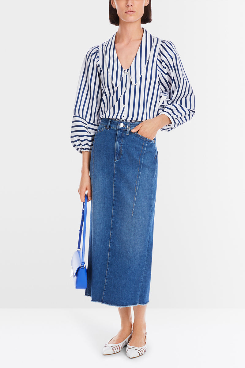 Blouse with tasselled trim