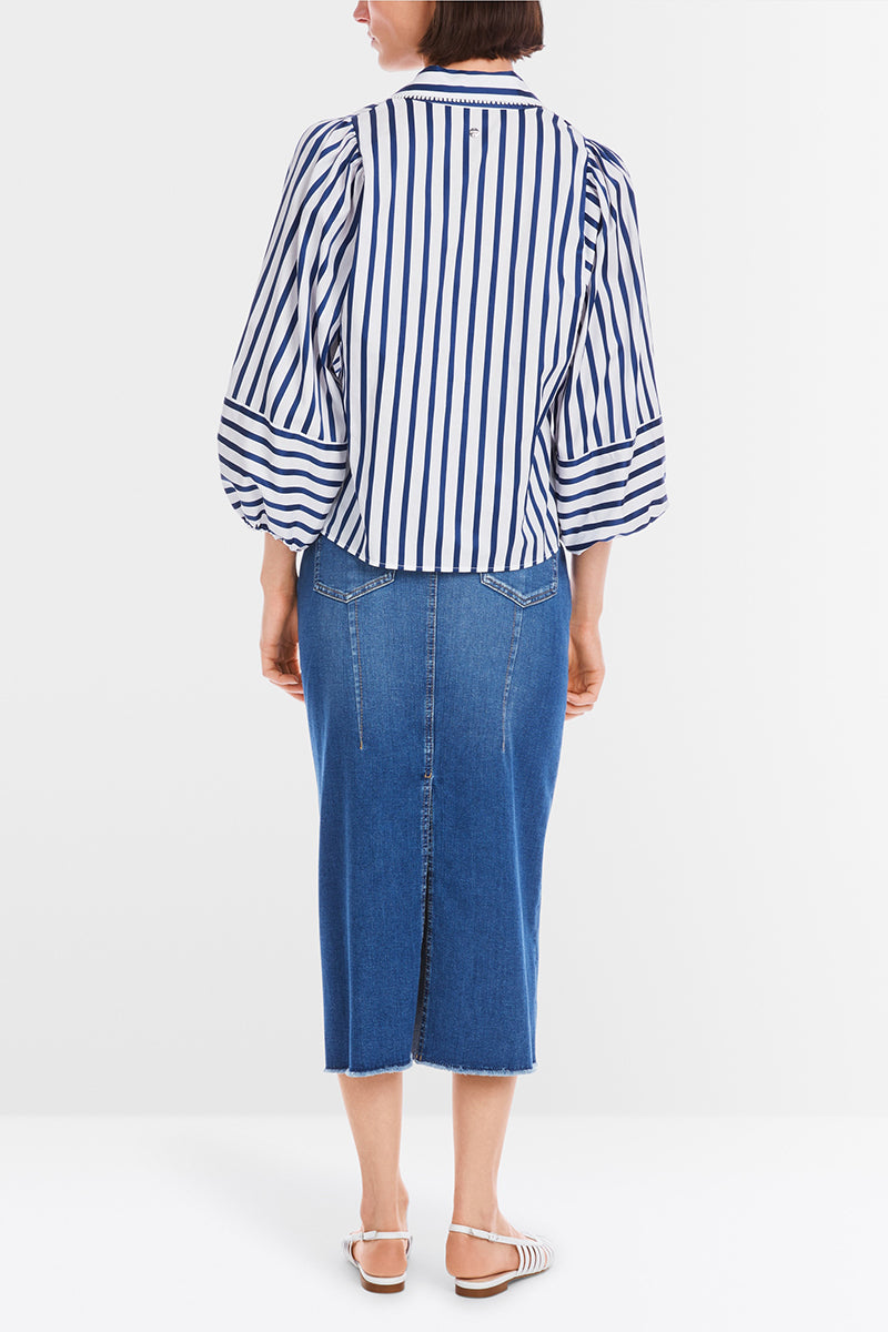 Blouse with tasselled trim