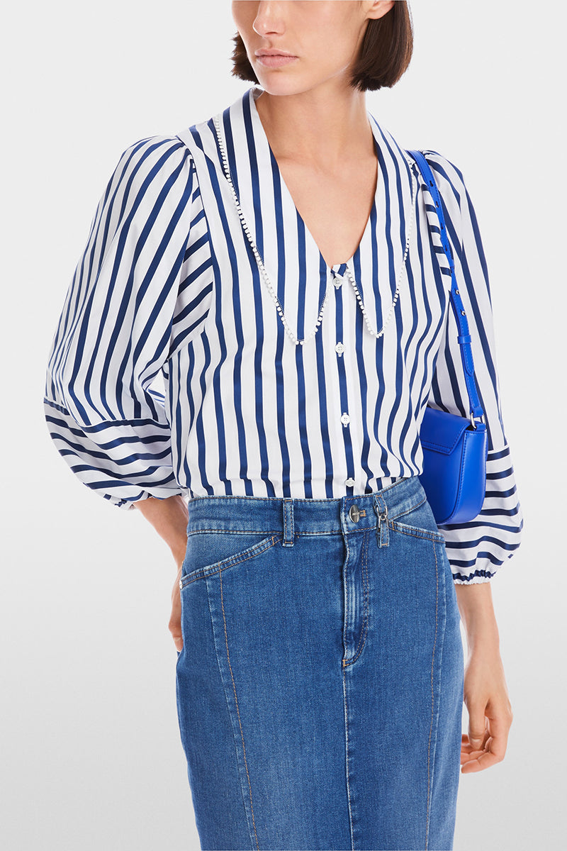 Blouse with tasselled trim