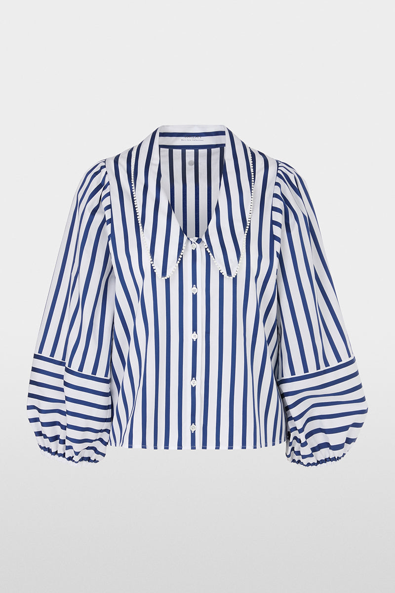 Blouse with tasselled trim