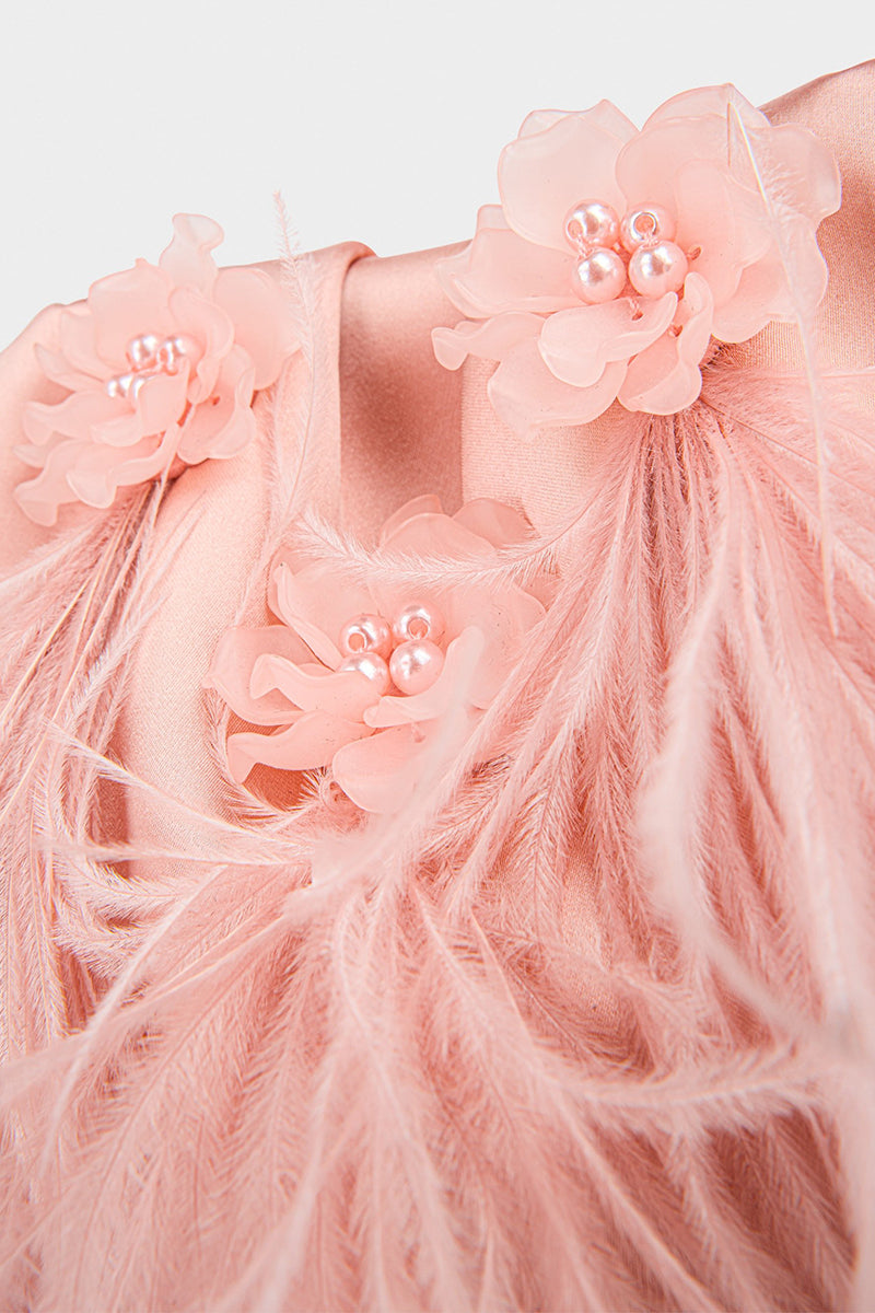 Elegant clutch bag with feathers