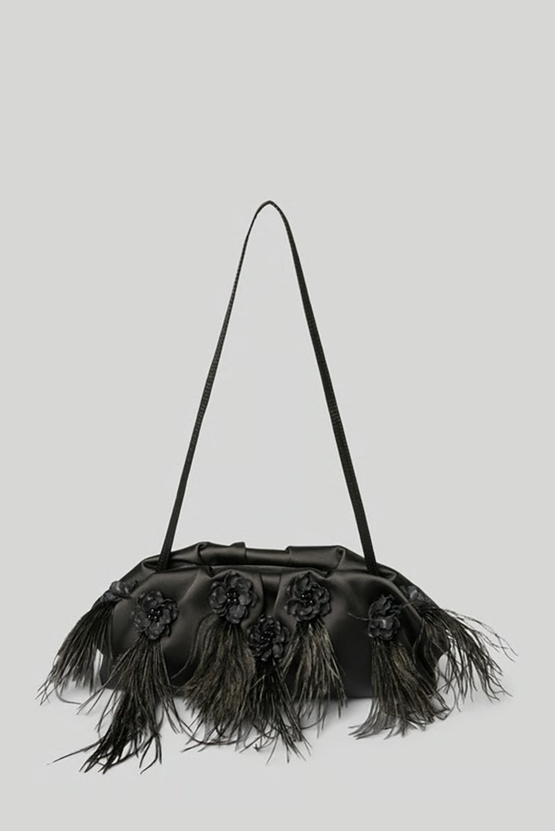 Elegant clutch bag with feathers