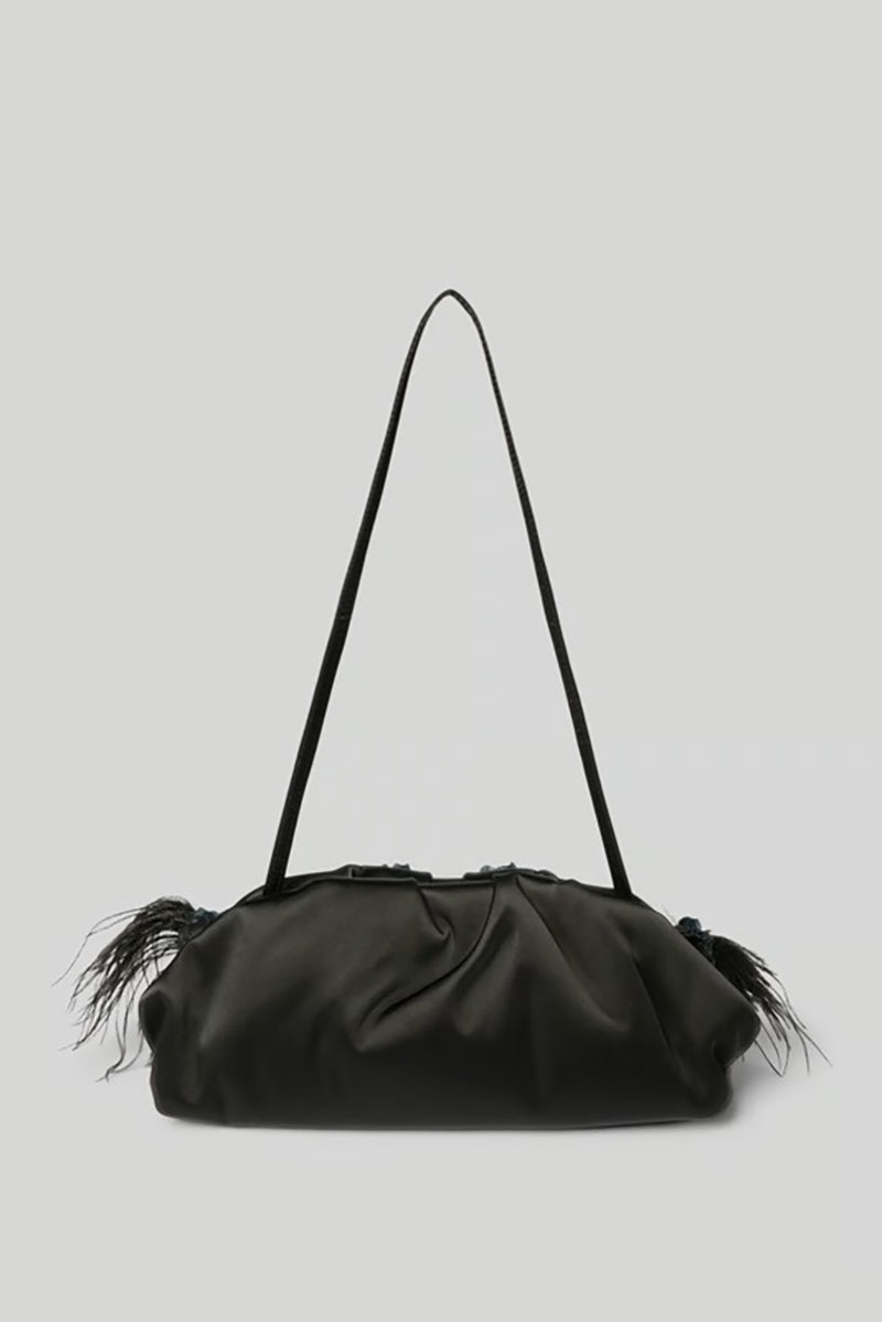 Elegant clutch bag with feathers