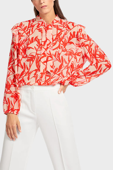 Frilly blouse with floral print